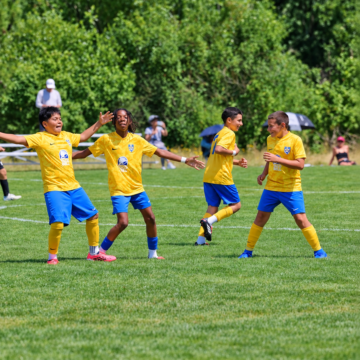 FC Salmon Creek players celebrating with medals